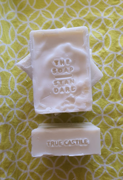 True Castile Soap Bars on yellow and white background.