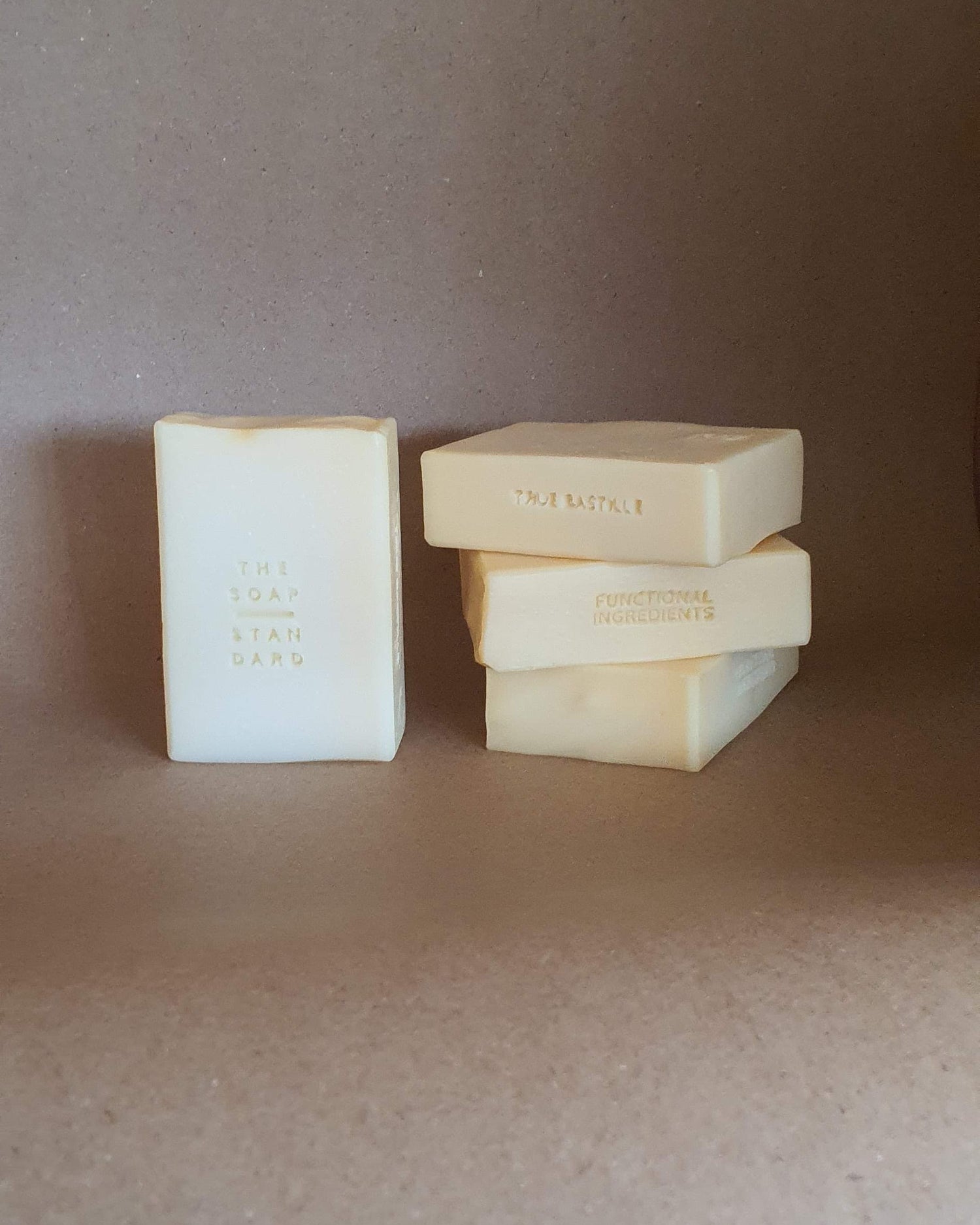 True Bastille Soap Bars on a brown background